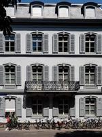 Calm narrow street, sunny summer day, cozy old downtown, Basel photo