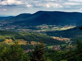 Spacious mountain landscape. A view from the mountain to the valley of Rhine and the village of Alsace. photo