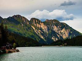 Lost in the mountains of Switzerland, Lake Arnesee with crystal clear waters of turquoise and azure colors. photo