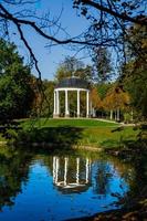 Autumn in the park Orangerie, Strasbourg, reflection in the water photo