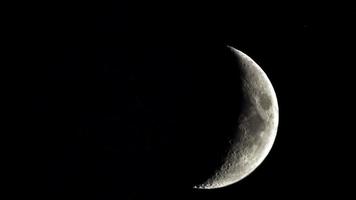 moon sickle in the night sky photo