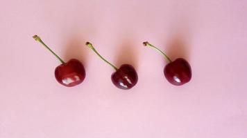 Sweet cherry backgroung on the table photo