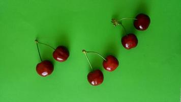 Sweet cherry backgroung on the table photo