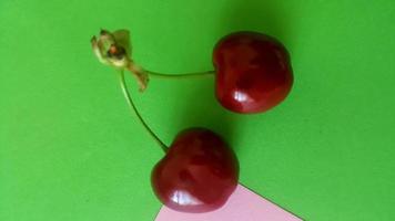 Sweet cherry backgroung on the table photo