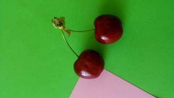Sweet cherry backgroung on the table photo