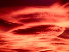 red sunset sky with clouds background photo