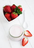 Jar with strawberry yogurt photo