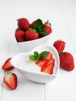 Bowl with strawberry yogurt photo