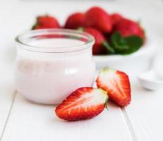 Jar with strawberry yogurt photo