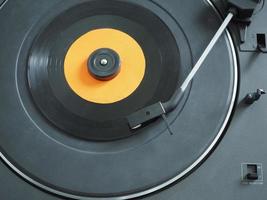 Vinyl record on turntable photo