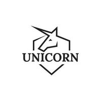 diseño de logotipo de escudo de unicornio vector