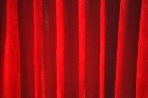 fondo de textura de tela de cortina roja foto