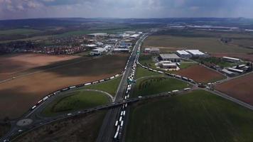 Aerial view of a traffic jam on a motorway in 4K video