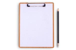 Top view clipboard with pencil on white background photo