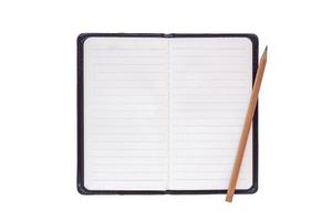 Notebook and pencil isolated on a white background. photo