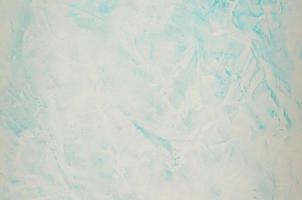 background of stucco textures with a marble effect turquoise colour. artistic background handmade photo