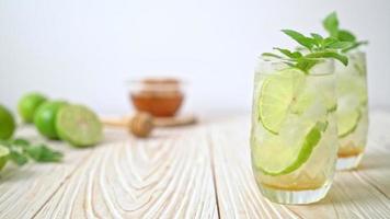 iced honey and lime soda with mint - refreshing drink video