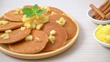 apple pancake or apple crepe with cinnamon powder