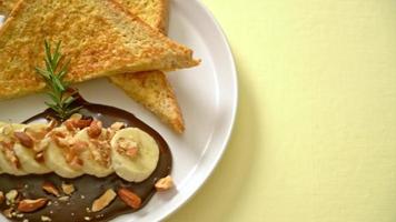 French toast with banana chocolate and almonds for breakfast video
