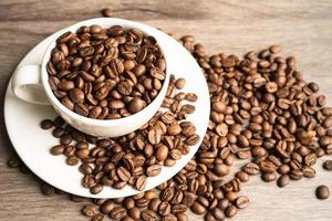 Coffee bean in cup with export text for import export trade commerce. photo