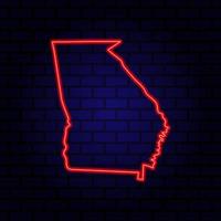 Neon map State of Georgia on brick wall background. photo