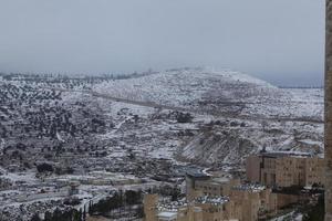 Snow in Jerusalem and the surrounding mountains photo