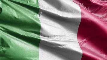 Italy textile flag slow waving on the wind loop. Italian banner smoothly swaying on the breeze. Fabric textile tissue. Full filling background. 20 seconds loop. video