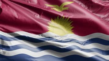 Kiribati flag slow waving on the wind loop. Kiribat banner smoothly swaying on the breeze. Full filling background. 20 seconds loop. video