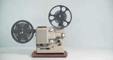 8 mm movie projector retro is playing. Vintage projector, 4K DCI video