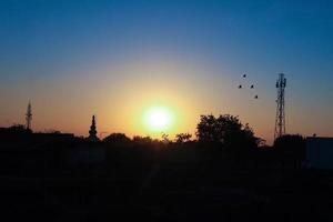 Beautiful sunrise or sunset lighting the clouds softly photo