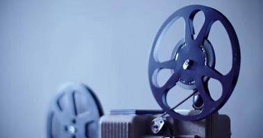 8 mm movie projector old retro old cinema in the dark room video