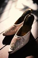 Elegant white wedding shoes photo