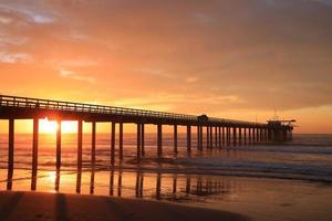 Beautiful sunset in Scripps Pier, San Diego photo