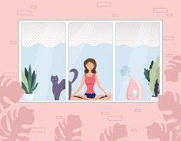 A nice young woman is sitting in a yoga and meditation pose with a cat next to her. Meditation, relaxation at home with a view from the window. Vector illustration.