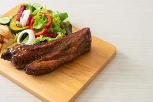 barbecue pork spare ribs with vegetables photo