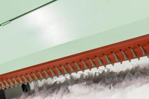 carding machine in spinning workshop. equipment and technologies at the textile factory photo