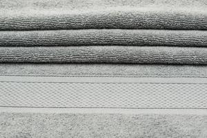 bath towel with folds. textured fabric background photo
