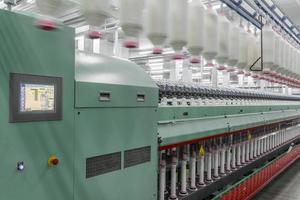 spools of thread at a textile factory photo