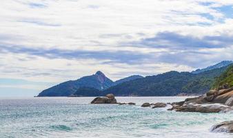 Rocks waves Praia Lopes Mendes beach Ilha Grande island Brazil. photo