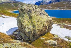 Huge boulder big rock Vavatn lake in Hemsedal Viken Norway. photo