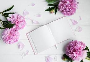 note book with peonies photo