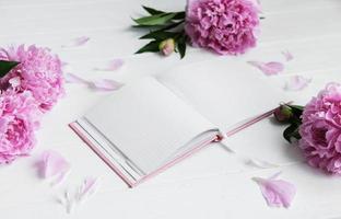 note book with peonies photo