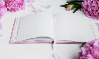 note book with peonies photo