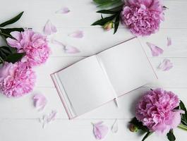 note book with peonies photo