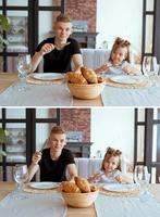 caucasian funny cute siblings -little girl with older brother in dining room in modern loft interior. Family, lifestyle and eating concept photo