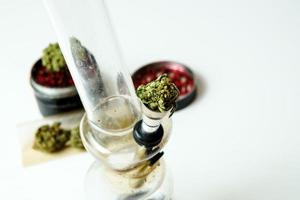 Close-up of medical marijuana buds on white background photo