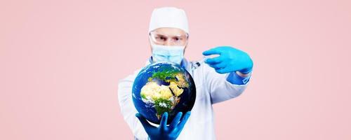 Doctor hold a earth globe in hands and a medical syringe with vaccine against corona virus. 3D rendering. Elements of this image furnished by NASA. photo