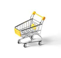 empty shopping trolley isolated on white background. close-up of shopping cart on white background with some copy space. photo
