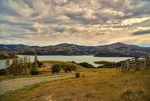 View over the top of the hill in Akaroa photo