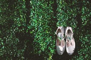 Elegant white wedding shoes photo